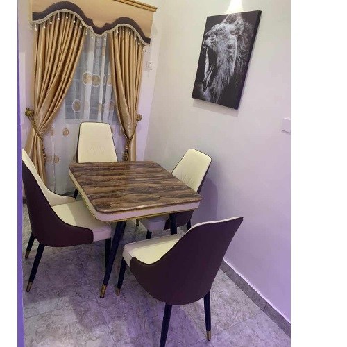 QUALITY DESIGNED BROWN MARBLE DINING TABLE WITH 4 CHAIRS - AVAILABLE (MOBIN)  - deluxe.com.ng