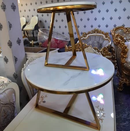 1 PC OF WHITE ROUND MARBLE TOP CENTER WITH GOLDEN TRIANGLE LEGS BY 2 SIDE STOOLS (NWAFU)