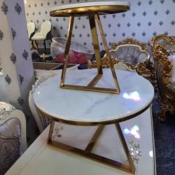 1 PC OF WHITE ROUND MARBLE TOP CENTER WITH GOLDEN TRIANGLE LEGS BY 2 SIDE STOOLS (NWAFU)